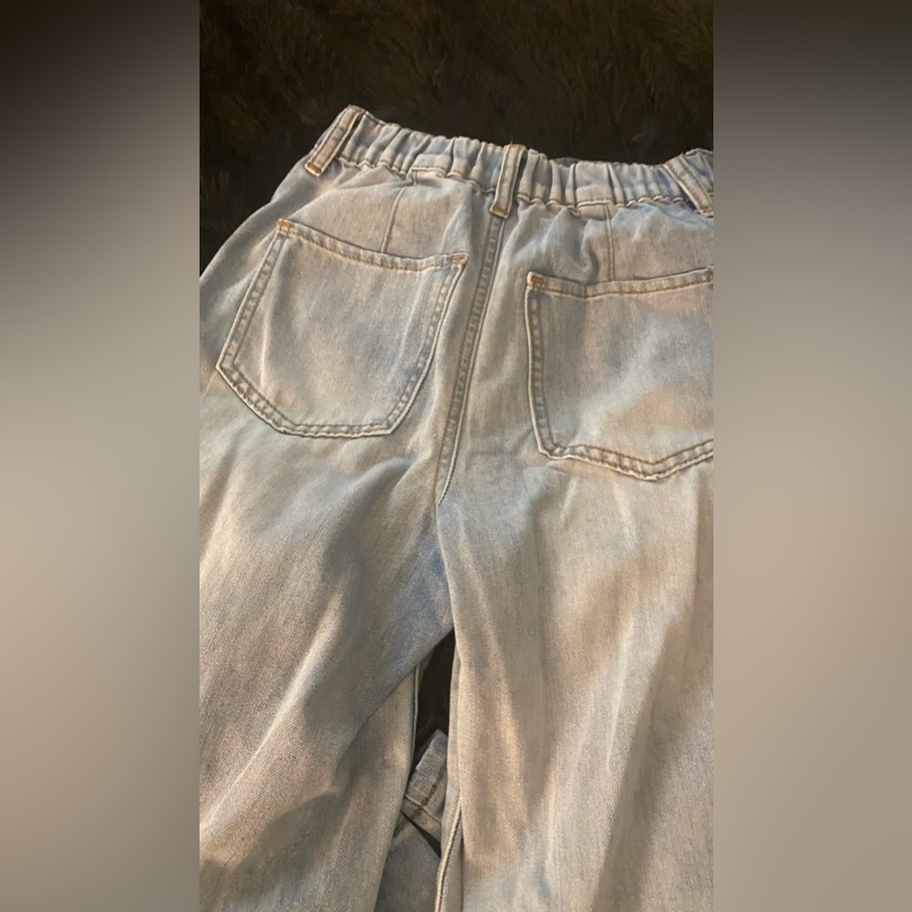 Bleached blue Jean wide legged snatched waist